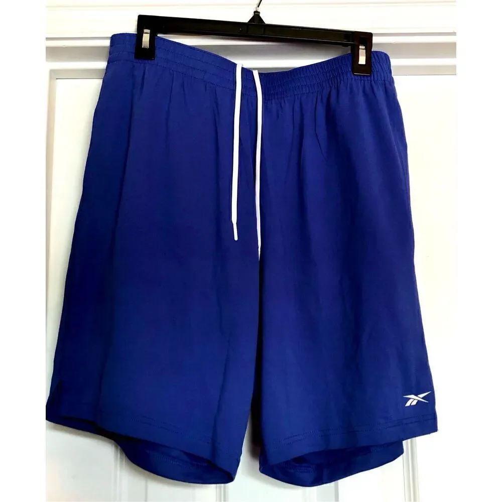 REEBOK - NWT - M Sz Medium Speedwick Active Shorts in Victor Blue. POCKETS!